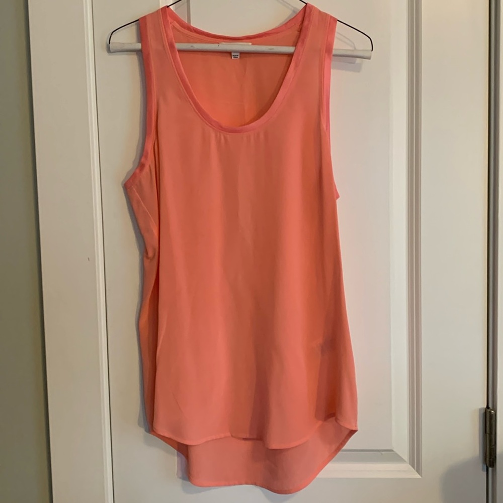 Equipment Semi-sheer silk tank top.